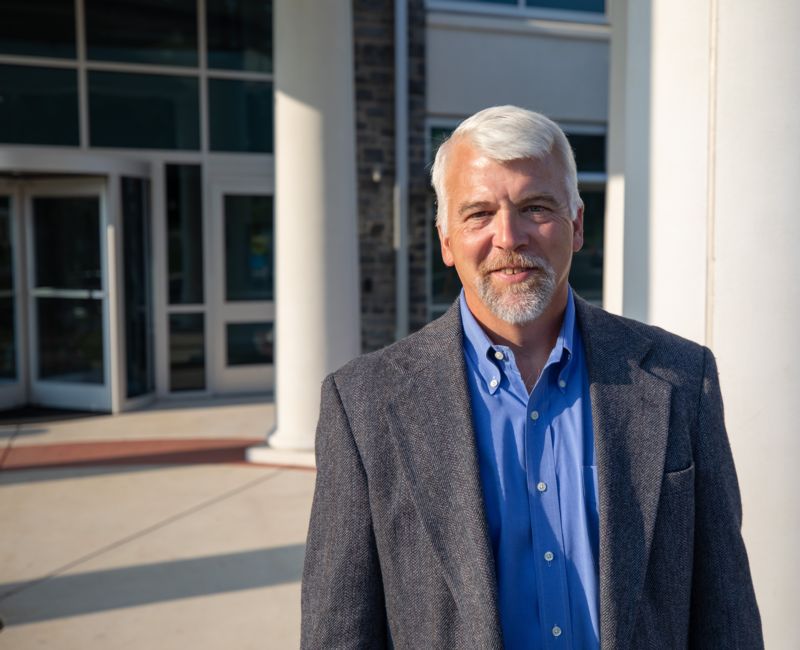 Myron Blosser standing outside City Council building
